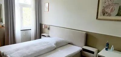 Ein Bett oder Betten in einem Zimmer der Unterkunft Premium Studio in zentraler Lage Mannheims