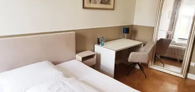 Ein Bett oder Betten in einem Zimmer der Unterkunft Premium Studio in zentraler Lage Mannheims