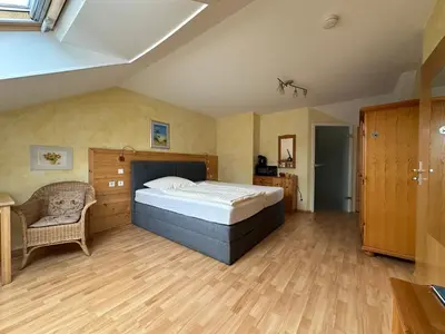 Ein Bett oder Betten in einem Zimmer der Unterkunft Pension Schramm
