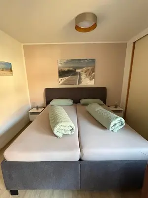 Ein Bett oder Betten in einem Zimmer der Unterkunft Apartment Gerberbachviertel