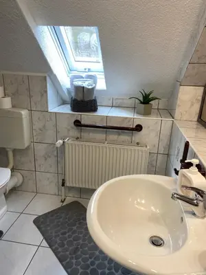 Ein Badezimmer in der Unterkunft Ferienwohnung am Erbacher Mümlingufer