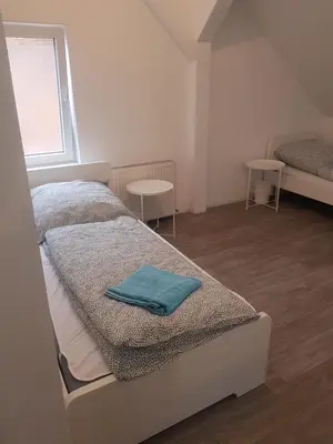 Ein Bett oder Betten in einem Zimmer der Unterkunft Apartments für Monteure - Heilbronn