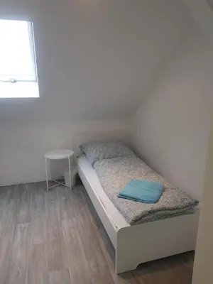 Ein Bett oder Betten in einem Zimmer der Unterkunft Apartments für Monteure - Heilbronn