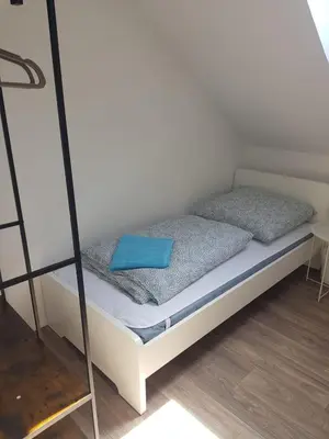 Ein Bett oder Betten in einem Zimmer der Unterkunft Apartments für Monteure - Heilbronn
