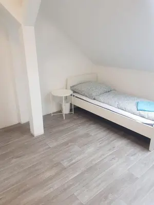 Ein Bett oder Betten in einem Zimmer der Unterkunft Apartments für Monteure - Heilbronn