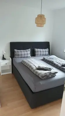 Ein Bett oder Betten in einem Zimmer der Unterkunft Ferienwohnung Villa Portugal