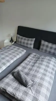 Ein Bett oder Betten in einem Zimmer der Unterkunft Ferienwohnung Villa Portugal