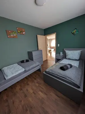 Ein Bett oder Betten in einem Zimmer der Unterkunft FeWo Laura