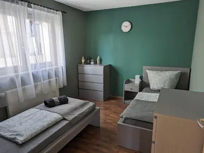 Ein Bett oder Betten in einem Zimmer der Unterkunft FeWo Laura