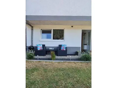 Ein Sitzbereich in der Unterkunft Holiday apartment Glockenhorn