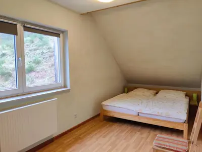 Ein Bett oder Betten in einem Zimmer der Unterkunft Ferienhaus Route 5