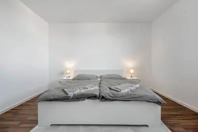 Ein Bett oder Betten in einem Zimmer der Unterkunft Casa Bergblick
