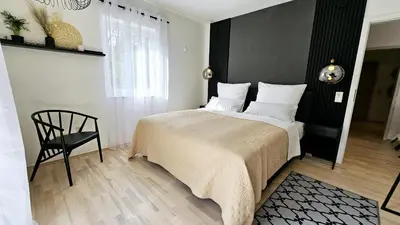 Ein Bett oder Betten in einem Zimmer der Unterkunft Ferienwohnungen Krüger 'Apartment Marina'