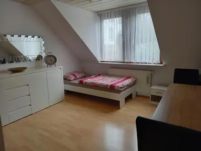 Ein Bett oder Betten in einem Zimmer der Unterkunft Ferienwohnung Enz, 3 OG.