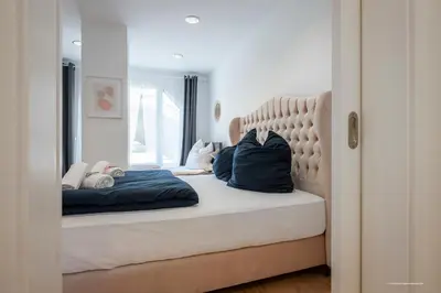 Ein Bett oder Betten in einem Zimmer der Unterkunft XXL Appartement Highdesign 10 Pers zentral nähe Heidelberg und Mannheim