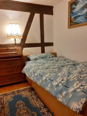 Ein Bett oder Betten in einem Zimmer der Unterkunft Bad Wimpfen Altstadt - ruhige, private Unterkunft