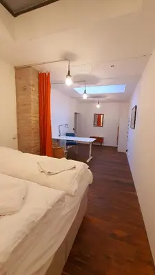 Ein Bett oder Betten in einem Zimmer der Unterkunft Loft im Szeneviertel Mannheims