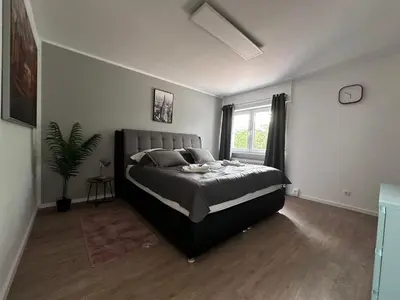 Ein Bett oder Betten in einem Zimmer der Unterkunft Premium Apartments Schwetzingen, Heidelberg, Speyer