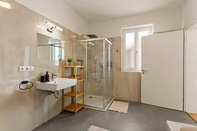 Ein Badezimmer in der Unterkunft Whirlpool & Terrasse - Familien & Gruppenfreundlich