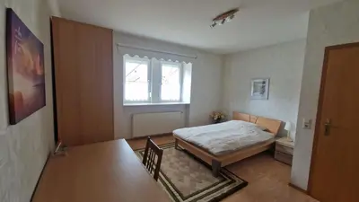 Ein Bett oder Betten in einem Zimmer der Unterkunft FeWo Kirchgässle