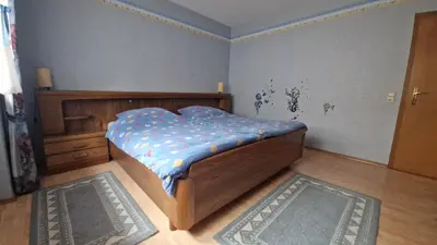 Ein Bett oder Betten in einem Zimmer der Unterkunft FeWo Kirchgässle