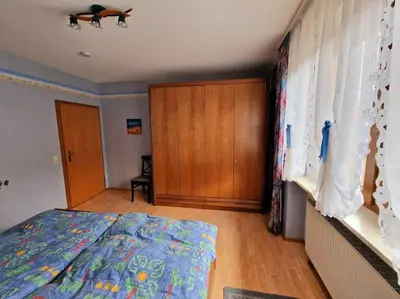 Ein Bett oder Betten in einem Zimmer der Unterkunft FeWo Kirchgässle