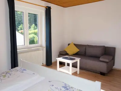 Ein Sitzbereich in der Unterkunft Pension Sonnenberg Comfortable holiday residence