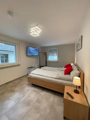 Ein Bett oder Betten in einem Zimmer der Unterkunft Bonnavista Ferienwohnungen