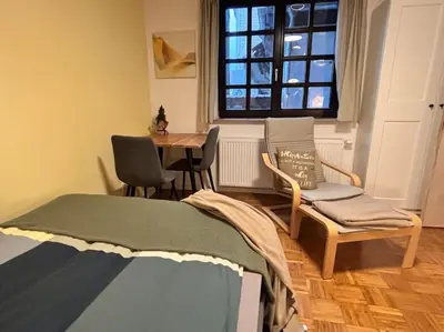 Ein Bett oder Betten in einem Zimmer der Unterkunft Stilvoll mitten Neu-Isenburg