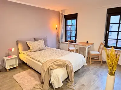 Ein Bett oder Betten in einem Zimmer der Unterkunft Gemütlich Mitten in Neu-Isenburg