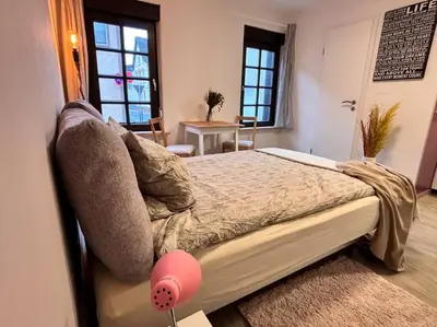 Ein Bett oder Betten in einem Zimmer der Unterkunft Gemütlich Mitten in Neu-Isenburg
