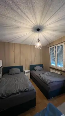 Ein Bett oder Betten in einem Zimmer der Unterkunft City Unterkunft 3
