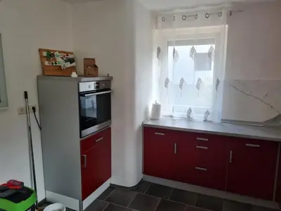 Küche/Küchenzeile in der Unterkunft Husic Immobilien und Handwerkerservice