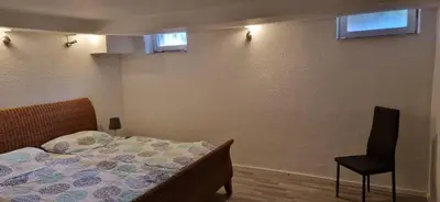 Ein Bett oder Betten in einem Zimmer der Unterkunft Ferienwohnung am Panoramaweg