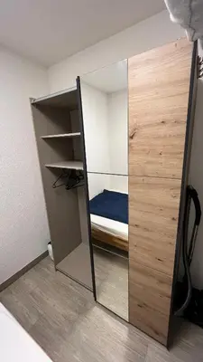 Ein Bett oder Betten in einem Zimmer der Unterkunft Gemütlich, ländlich, stadtnah