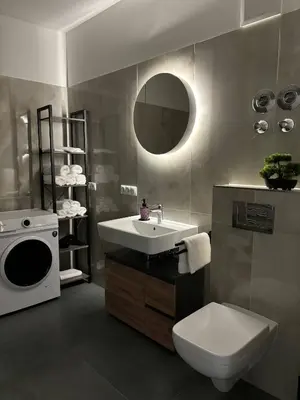 Ein Badezimmer in der Unterkunft Großes zentrales Apartment Terrasse 2 Bäder