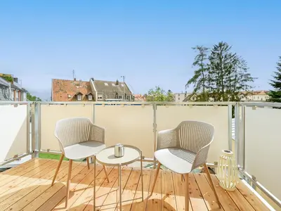 Ein Balkon oder eine Terrasse in der Unterkunft FLAIR Homes - Design Apartments with Smart-TV, Self Check-in & Free Parking