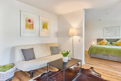 Ein Bett oder Betten in einem Zimmer der Unterkunft Modernes Studio-Apartment in toller Waldrand-Lage