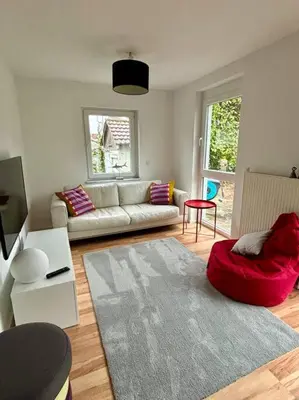 Ein Sitzbereich in der Unterkunft Ferienwohnung am Wartturm