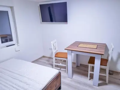 Ein Bett oder Betten in einem Zimmer der Unterkunft Shared house Gebersheim Leonberg