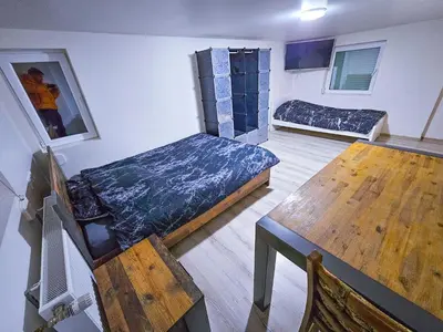 Ein Bett oder Betten in einem Zimmer der Unterkunft Shared house Gebersheim Leonberg
