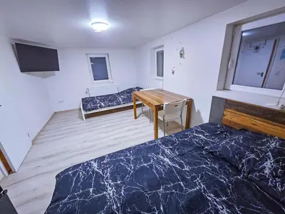 Ein Bett oder Betten in einem Zimmer der Unterkunft Shared house Gebersheim Leonberg