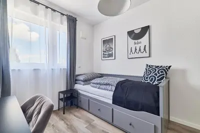 Ein Bett oder Betten in einem Zimmer der Unterkunft Neubau Luxus Penthouse - Netflix - BBQ