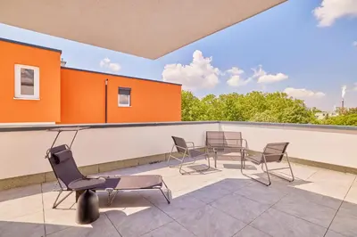 Ein Balkon oder eine Terrasse in der Unterkunft Neubau Luxus Penthouse - Netflix - BBQ