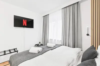 Ein Bett oder Betten in einem Zimmer der Unterkunft Nähe Hauptbahnhof, Kingsize Bett, H-Office, Netflix