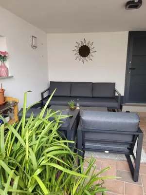 Ein Sitzbereich in der Unterkunft Ferienwohnung Lang