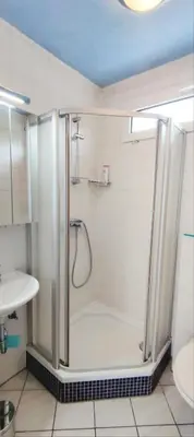 Ein Badezimmer in der Unterkunft Gemütliches Gästehaus am Park