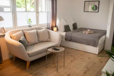Ein Sitzbereich in der Unterkunft HUGOS Studio Apartment