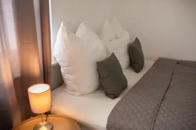 Ein Bett oder Betten in einem Zimmer der Unterkunft HUGOS Studio Apartment