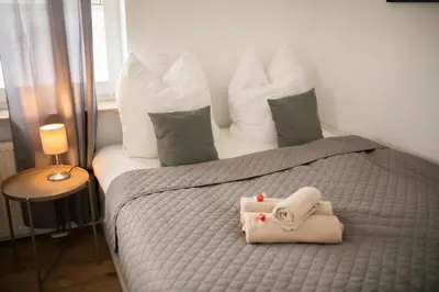 Ein Bett oder Betten in einem Zimmer der Unterkunft HUGOS Studio Apartment